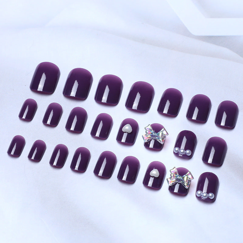 Wearing Nails With Diamonds And Purple Fake Nails-3