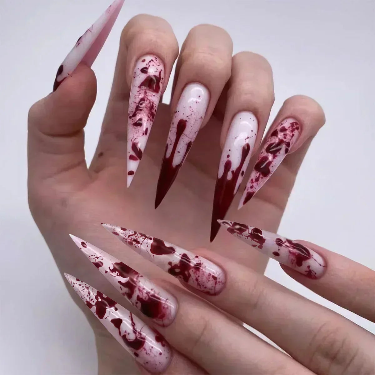 Whimsical Clown Almond Press-On Nails on!-4