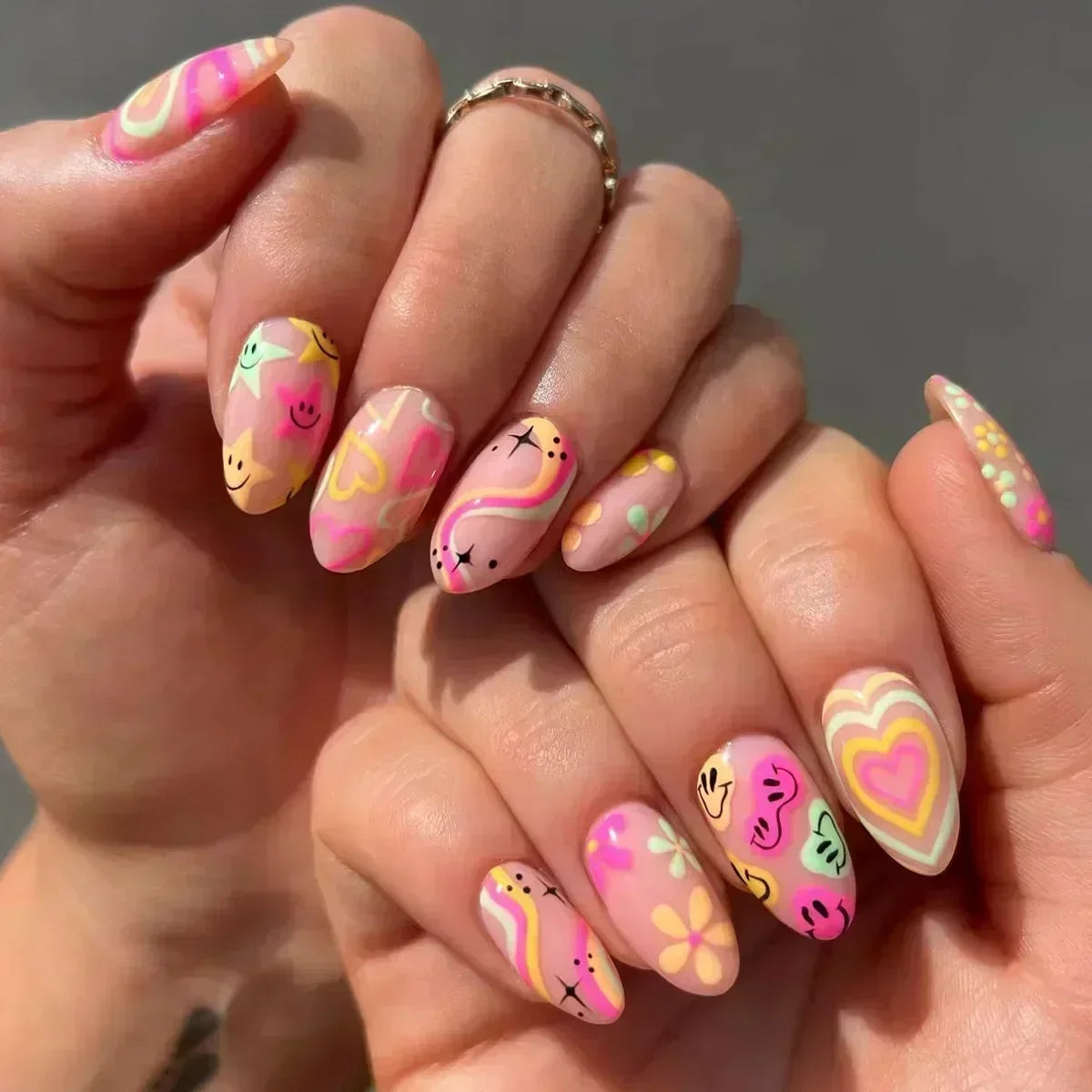 Whimsical Clown Almond Press-On Nails on!-28